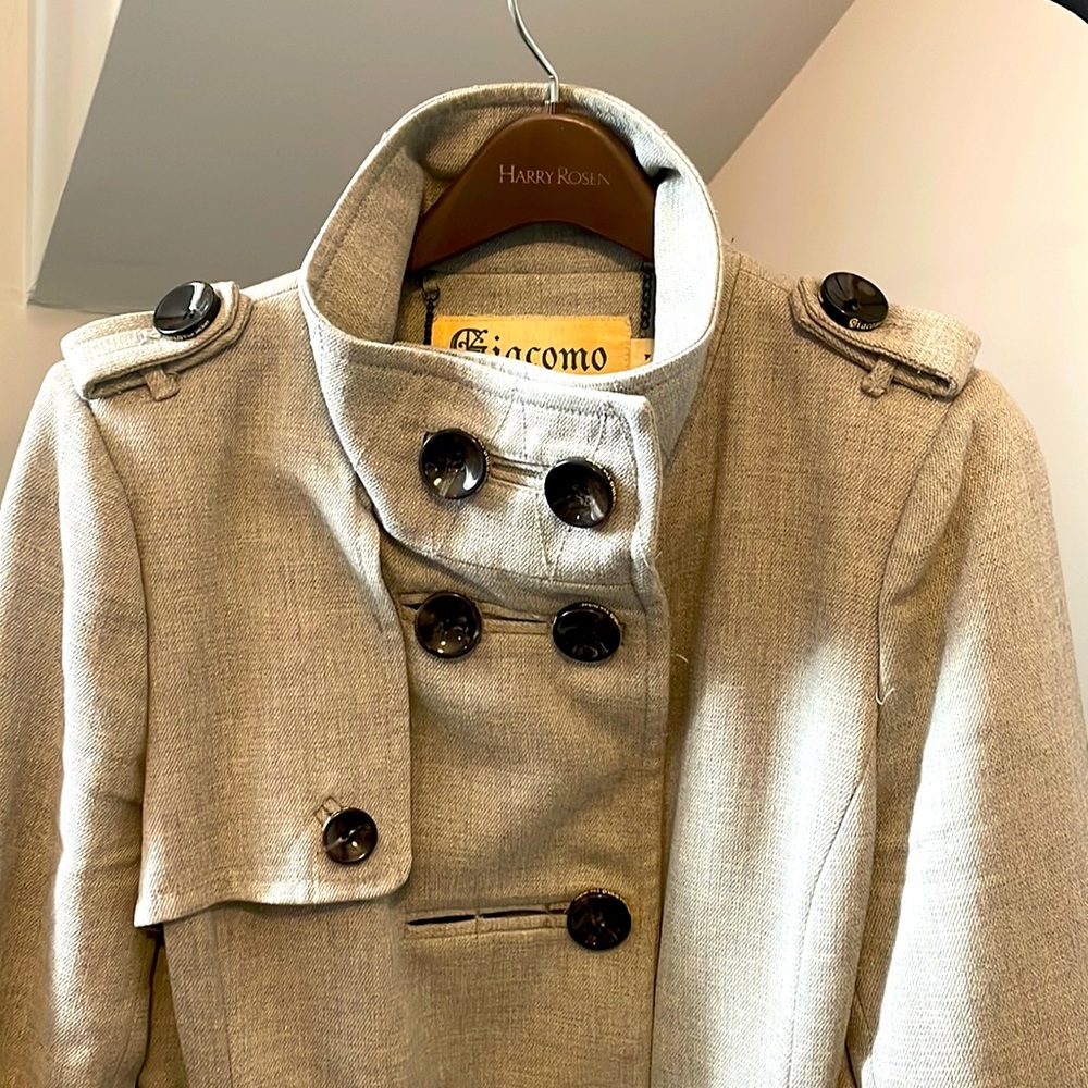 Grey trench military style Fall/Early Winter jacket.